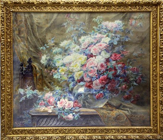 § Blanche Odin (1865-1957) Still life of roses in a glass vase, upon a table 57 x 68.5in.